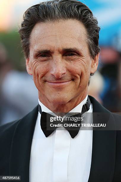 Producer Lawrence Bender poses on the red carpet as he arrives for the screening of "Mr Holmes" during the 41st Deauville US Film Festival in the...