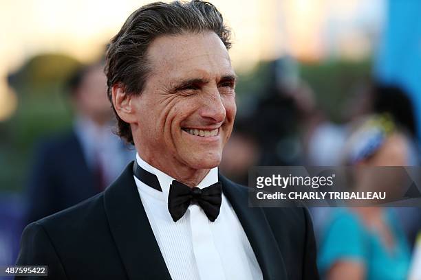 Producer Lawrence Bender poses on the red carpet as he arrives for the screening of "Mr Holmes" during the 41st Deauville US Film Festival in the...