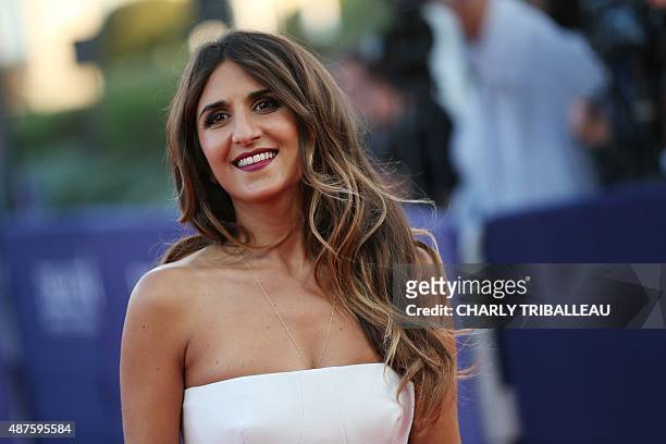 French actress Geraldine Nakache poses on the red carpet as she arrives for the screening of "Mr Holmes" during the 41st Deauville US Film Festival...