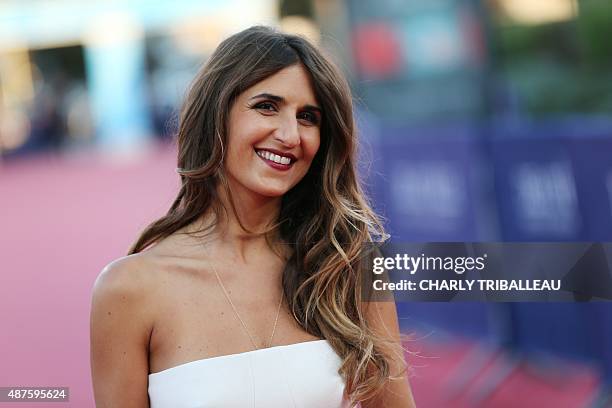 French actress Geraldine Nakache poses on the red carpet as she arrives for the screening of "Mr Holmes" during the 41st Deauville US Film Festival...