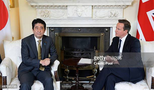 British Prime Minister David Cameron welcomes the Prime Minister of Japan Shinzo Abe to 10 Downing Street on May 1, 2014 in London, England.
