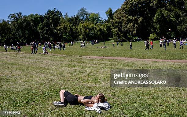 People enjoy a sunny day at the Villa Ada park in Rome, on May 1st, 2014. Many people in Italy spend Labor Day, also known as La Festa dei Lavoratori...