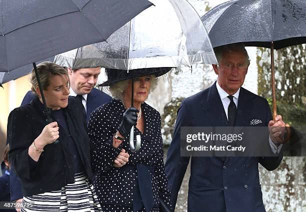 Laura Lopes, Camilla, Duchess of Cornwall, and Prince Charles, Prince of Wales arrive for Mark Shands funeral at Holy Trinity Church in Stourpaine on...