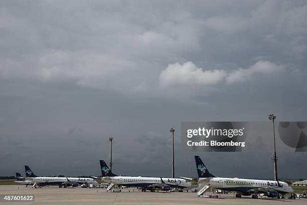 Azul Linhas Aereas Brasileiras SA jets sit on the tarmac at Viracopos International Airport in Campinas, Brazil, on Wednesday, Sept. 9, 2015. Azul...