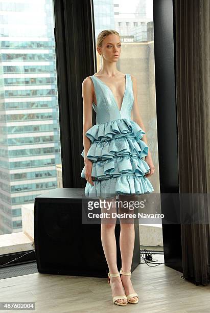 Model wearing John Paul Ataker poses during A Taste Of John Paul Ataker Presentation Spring 2016 New York Fashion Week at The Skylark on September...