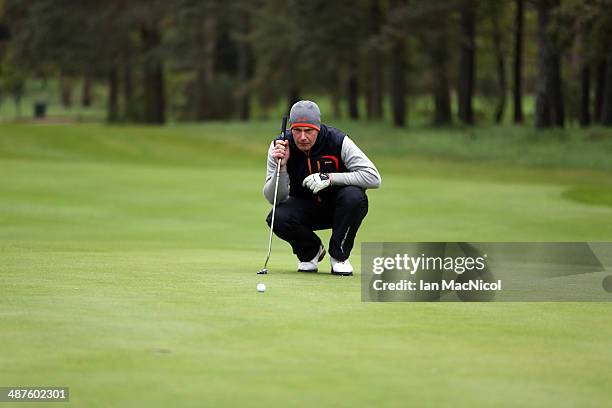 Andrew Crerar of Panmure Golf Club lines up a putt during the Glenmuir PGA Professional Championships - Scottish at Blairgowrie Golf Course on May...