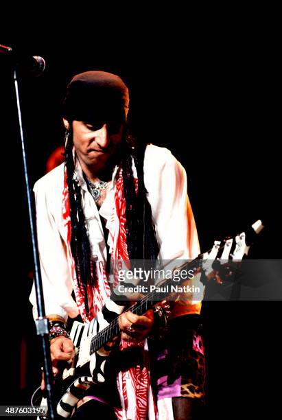 American musician Steven Van Zandt plays guitar as he performs onstage, Chicago, Illinois, July 27, 1984.