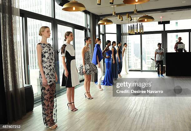 Models wearing John Paul Ataker pose during A Taste Of John Paul Ataker Presentation Spring 2016 New York Fashion Week at The Skylark on September...