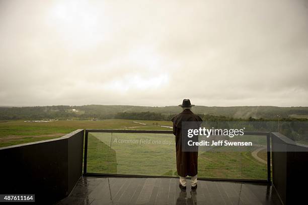 Visitor braves the rain at the visitor center at the Flight 93 National Memorial on September 10, 2015 in Shanksville, Pennsylvania. The newly opened...