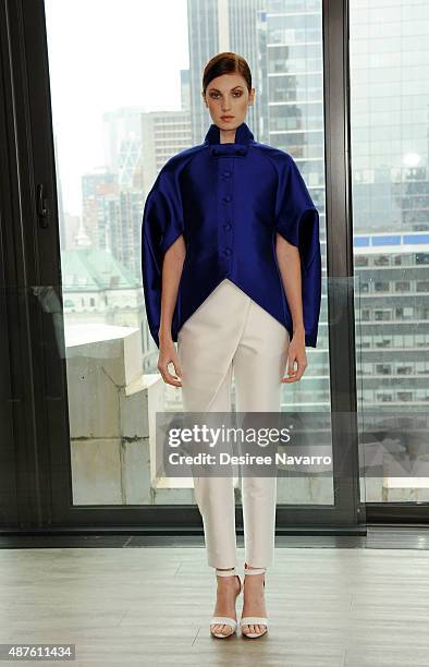 Model wearing John Paul Ataker poses during A Taste Of John Paul Ataker Presentation Spring 2016 New York Fashion Week at The Skylark on September...