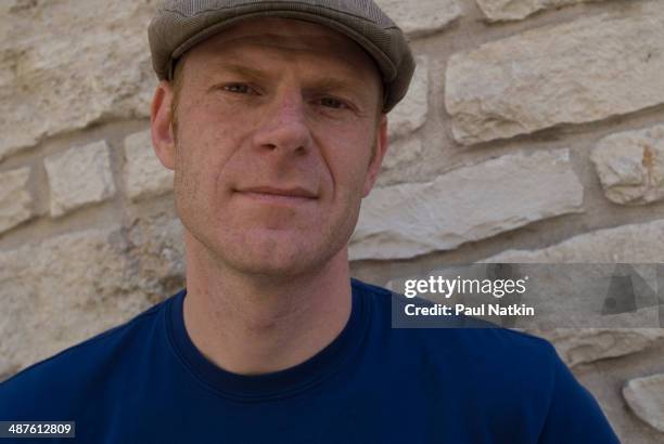 Portrait of Dutch musician and producer Junkie XL as he poses against a stone wall during the South by Southwest music festival, Austin, Texas, March...