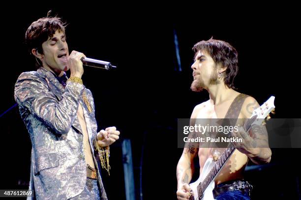 American musicians Perry Farrell and Dave Navarro of the band Jane's Addiction perform onstage, Milwaukee, Wisconsin, July 11, 2003.