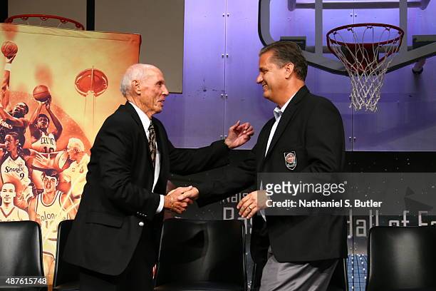John Calipari and Dick Bavetta greet each other during the Class of 2015 Press Event as part of the 2015 Basketball Hall of Fame Enshrinement...