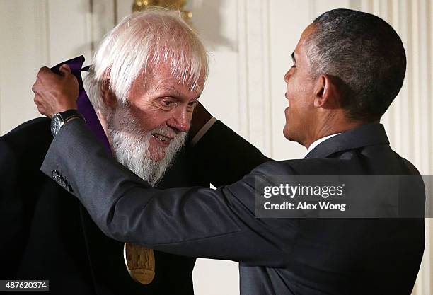 President Barack Obama presents the 2014 National Medal of Arts to John Baldessari during an East Room ceremony at the White House September 10, 2015...