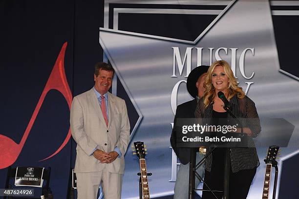 Karl Dean, Garth Brooks, and Tricia Yearwood attend an induction into the Nashville Walk Of Fame at Nashville Music City Walk of Fame on September...