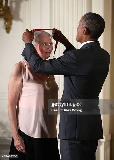 President Barack Obama presents the 2014 National Humanities Medal to Annie Dillard during an East Room ceremony at the White House September 10,...