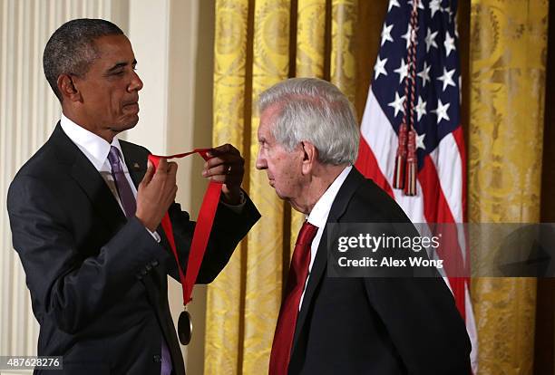 President Barack Obama presents the 2014 National Humanities Medal to Larry McMurtry during an East Room ceremony at the White House September 10,...