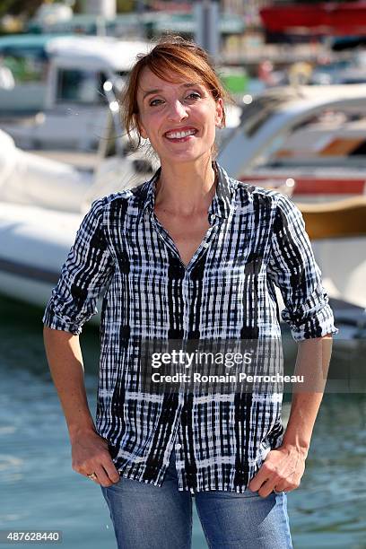 Actress Alix Poisson attends the photocall of "Parents Mode d'Emploi as part of the 17th Festival of TV Fiction of La Rochelle on September 10, 2015...