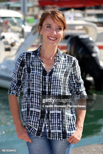 Actress Alix Poisson attends the photocall of "Parents Mode d'Emploi as part of the 17th Festival of TV Fiction of La Rochelle on September 10, 2015...