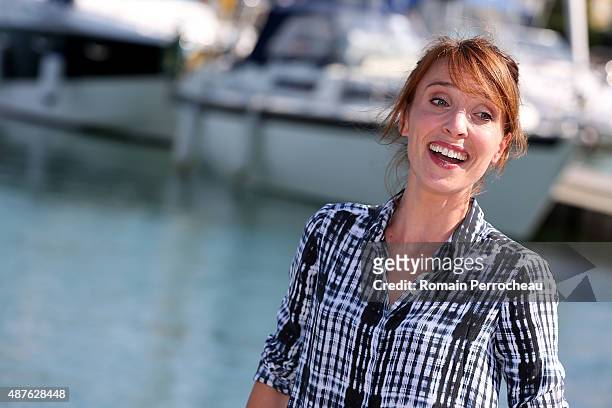 Actress Alix Poisson attends the photocall of "Parents Mode d'Emploi as part of the 17th Festival of TV Fiction of La Rochelle on September 10, 2015...