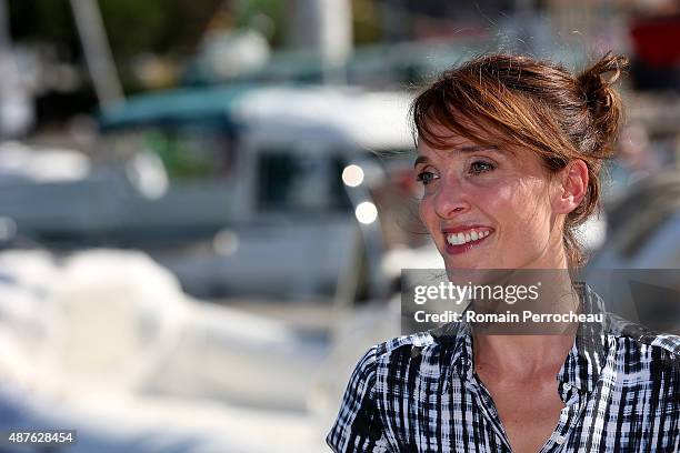 Actress Alix Poisson attends the photocall of "Parents Mode d'Emploi as part of the 17th Festival of TV Fiction of La Rochelle on September 10, 2015...