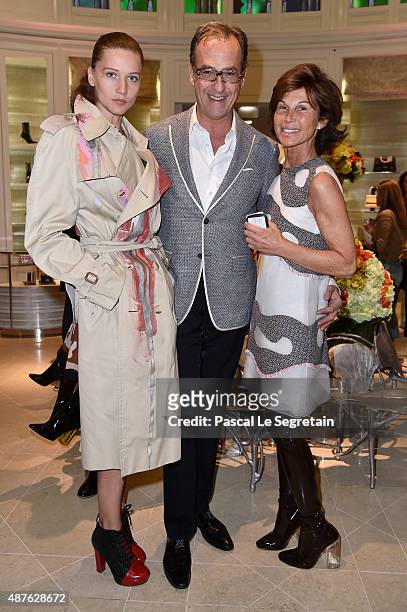 Emmanuel de Brantes standing between Sylvie Rousseau and Guest attend the 'Vendanges Montaigne 2015' at Dior at Avenue Montaigne on September 10,...