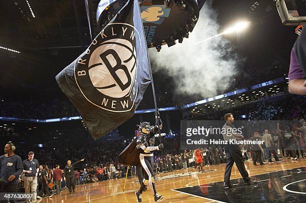 Playoffs: Brooklyn Nets mascot BrooklyKnight on court with flag during game vs Toronto Raptors at Barclays Center. Game 4. Brooklyn, NY 4/27/2014...