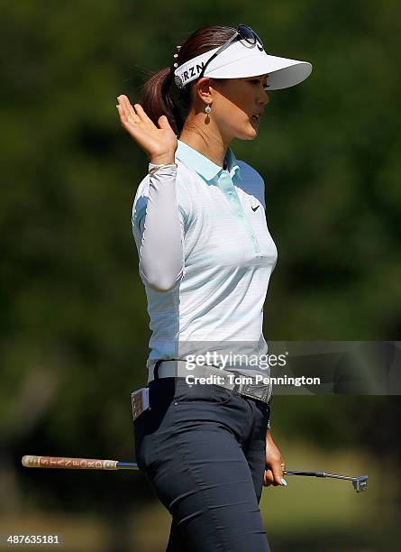 Michelle Wie reacts after holing an eagle putt on the 10th hole during Round One of the North Texas LPGA Shootout Presented by JTBC at the Las...