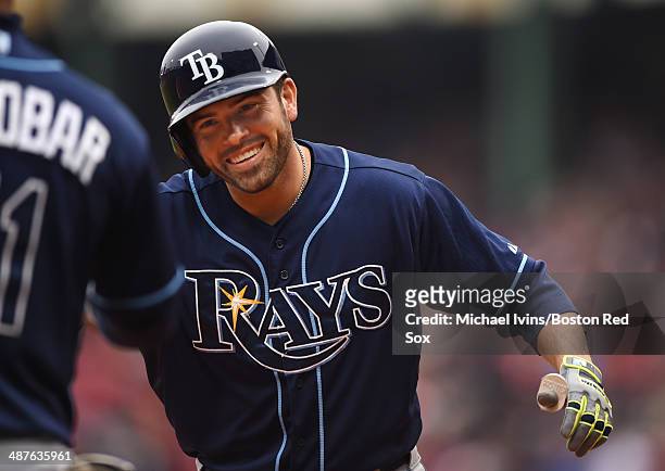 David DeJesus of the Tampa Bay Rays smiles after hitting a home run against Jake Peavy of the Boston Red Sox in the first inning of the first game of...