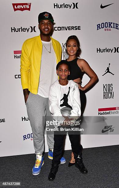Forward Carmelo Anthony, his wife La La Anthony and son Kiyan Anthony attend the Kids Rock! show during New York Fashion Week at The Dock, Skylight...