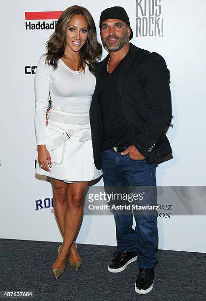 Melissa Gorga and Joe Gorga pose backstage at the Kids Rock! fashion show during Spring 2016 New York Fashion Week: The Shows at The Dock, Skylight...