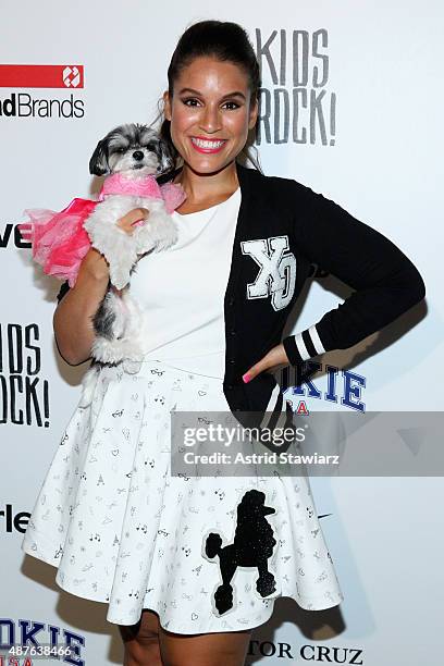 Gina Naomi Baez poses backstage at the Kids Rock! fashion show during Spring 2016 New York Fashion Week: The Shows at The Dock, Skylight at Moynihan...