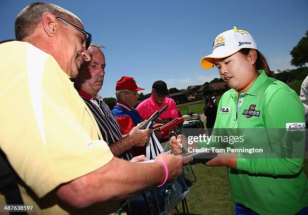 Inbee Park of South Korea signs autographs for fans after finishing Round One of the North Texas LPGA Shootout Presented by JTBC at the Las Colinas...