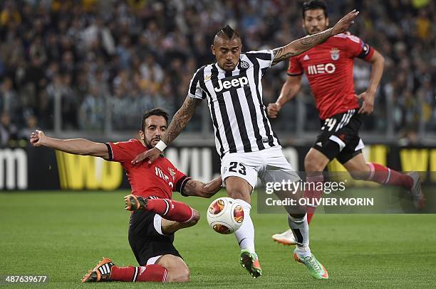 Juventus' Chilean midfielder Arturo Vidal vies with Benfica's midfielder Ruben Amorim during the UEFA Europa League semifinal football match Juventus...