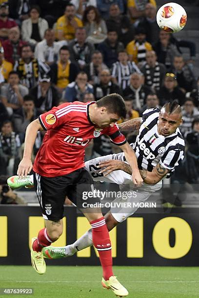 Benfica's Brazilian defender Guilherme Siqueira vies with Juventus' Chilean midfielder Arturo Vidal during the UEFA Europa League semifinal football...