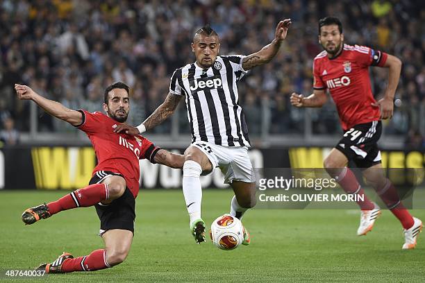 Juventus' Chilean midfielder Arturo Vidal vies with Benfica's midfielder Ruben Amorim during the UEFA Europa League semifinal football match Juventus...