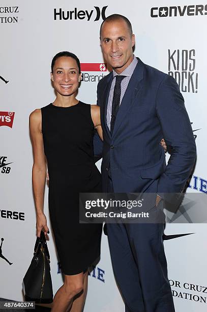 Cristen Barker and Nigel Barker pose backstage at the Kids Rock! fashion show during Spring 2016 New York Fashion Week: The Shows at The Dock,...