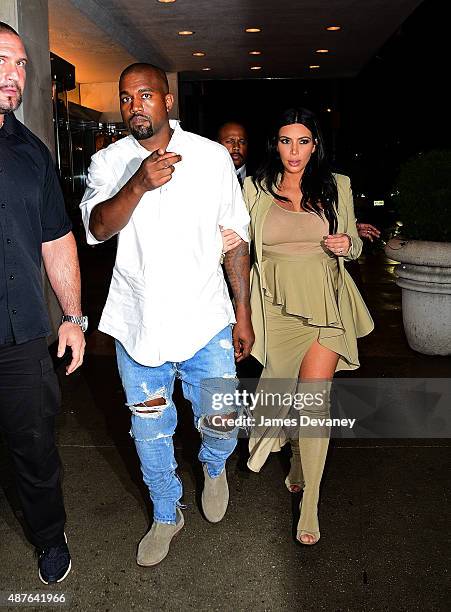Kanye West and Kim Kardashian arrive to Bergdorf Goodman on September 10, 2015 in New York City.