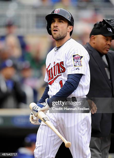 Sam Fuld of the Minnesota Twins reacts to striking out against the Los Angeles Dodgers during the sixth inning in game one of a doubleheader on May...