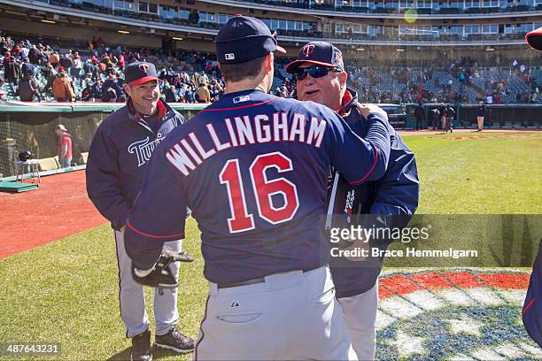 Ron Gardenhire of the Minnesota Twins is congratulated by Josh Willingham after his 1,000th career win against the Cleveland Indians on April 5, 2014...