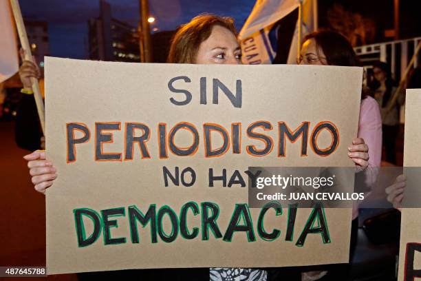 Activists of the NGO Fundamedios gather outside Ecuador's National Secretariat of Communications to protest against the governments' move to dissolve...