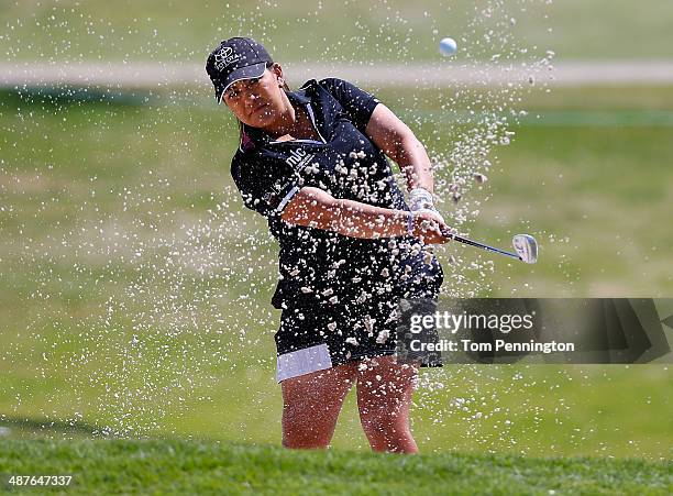 Lizette Salas hits a bunker shot during Round One of the North Texas LPGA Shootout Presented by JTBC at the Las Colinas Country Club on May 1, 2014...