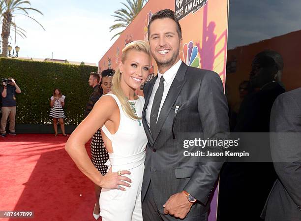 Singer Luke Bryan and Caroline Boyer attend the 2014 iHeartRadio Music Awards held at The Shrine Auditorium on May 1, 2014 in Los Angeles,...