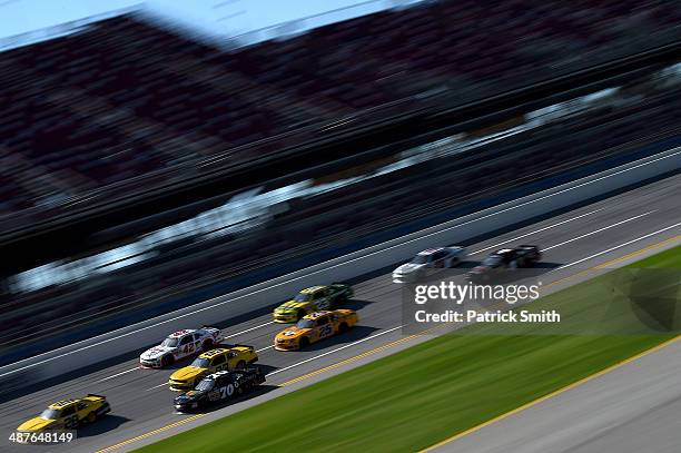 Pack of cars practice for the NASCAR Nationwide Series Aaron's 312 at Talladega Superspeedway on May 1, 2014 in Talladega, Alabama.