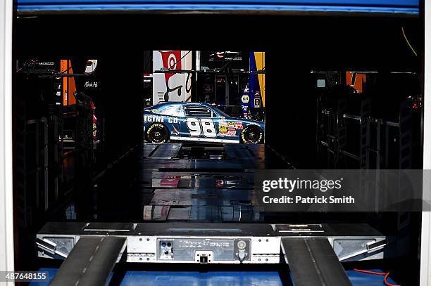 David Ragan, driver of the Carroll Shelby Engine Co Ford, drives through the garage area during practice for the NASCAR Nationwide Series Aaron's 312...