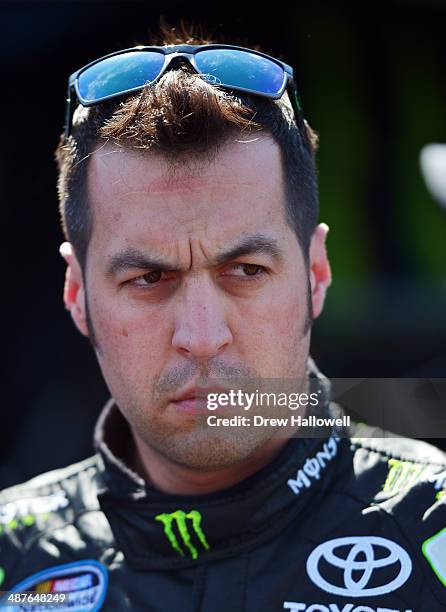 Sam Hornish Jr, driver of the Monster Energy Toyota, stands in the garage area during practice for the NASCAR Nationwide Series Aaron's 312 at...