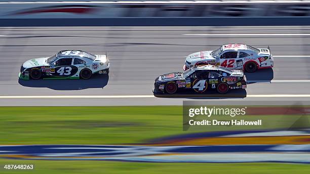 Dakota Armstrong, driver of the WinField Ford, leads a pack of cars during practice for the NASCAR Nationwide Series Aaron's 312 at Talladega...