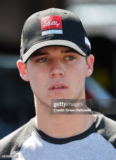 Ryan Reed, driver of the ADADrivetoStpDiabetesPresByLillyDiabetes Ford, stands in the garage area during practice for the NASCAR Nationwide Series...