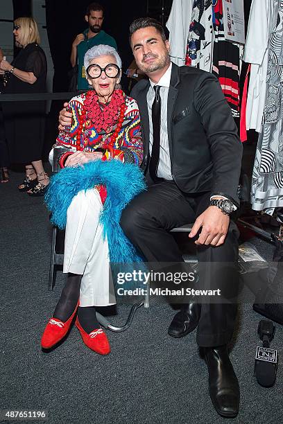 Iris Apfel and tv personality Rocco Leo Gaglioti attend the Desigual fashion show during Spring 2016 New York Fashion Week at The Arc, Skylight at...