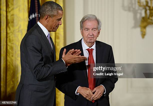 President Barack Obama presents novelist, essayist and screenwriter Larry McMurtry with the 2014 National Humanities Medal at The White House on...